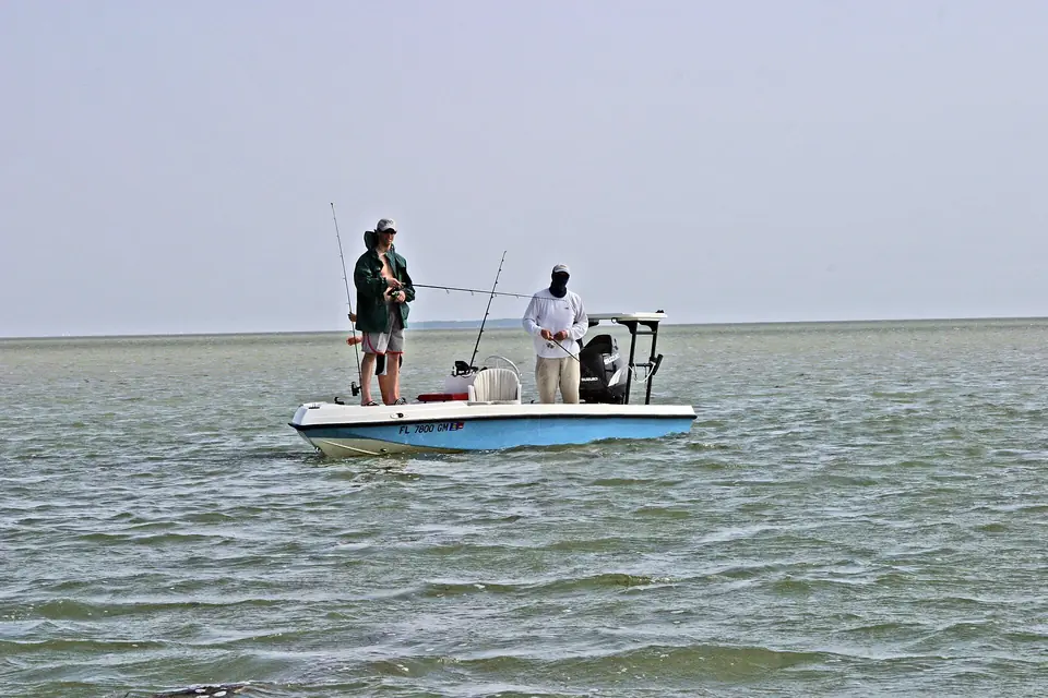 Anglers fishing from a flats skiff near the mangroves in Florida Bay